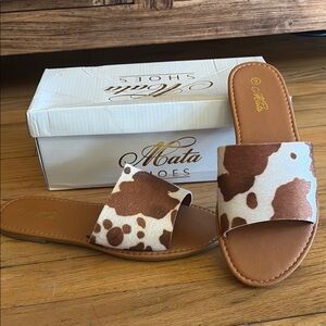 Mata Brown and White Cow Print Slides